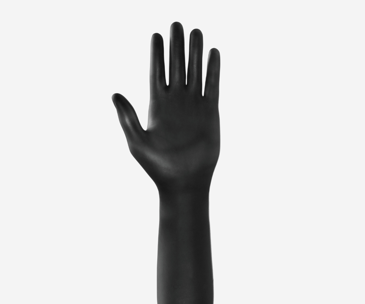 Black IneoGuard radiation attenuating surgical glove on a hand form