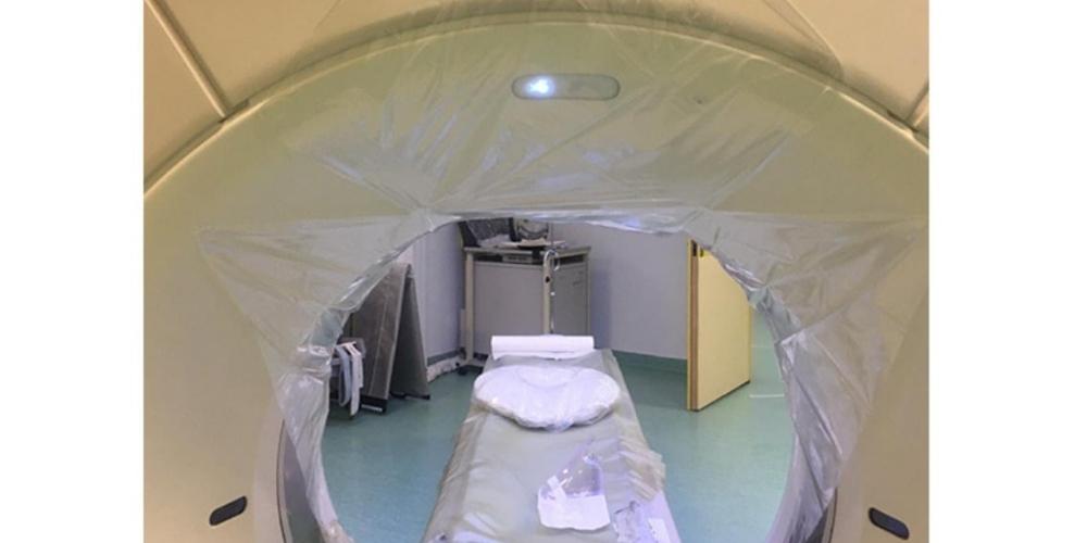Picture of a sterile drap covering a CT scanner