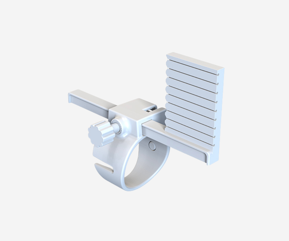 GTK150 needle guide shown at an angle with a vertical marked guide block and thumb screw adjustment